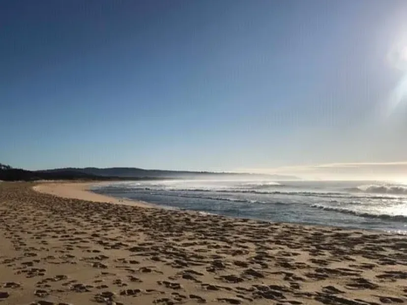 Wet sand at sunrise on the Wharf to Wharf route