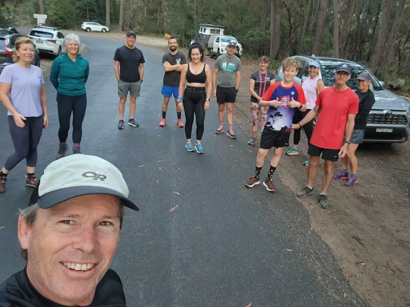 Selfie with Sapphire Coast Runners members running behind
