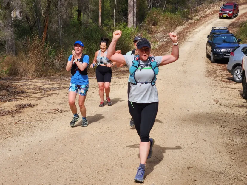Two Sapphire Coast Runners members running a bush trail together