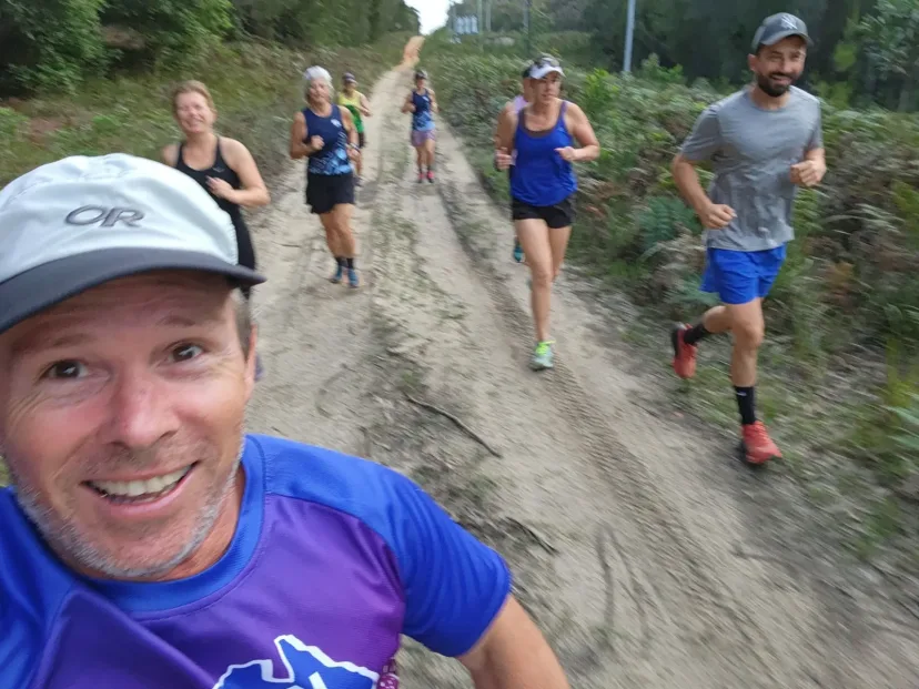 Selfie with Sapphire Coast Runners members running behind