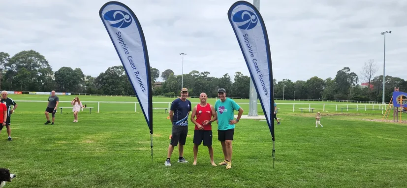 Club flags set up for a Sapphire Coast Runners session