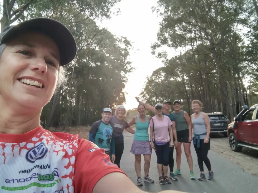 Selfie with Sapphire Coast Runners members running behind