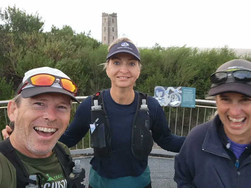 Selfie with Sapphire Coast Runners members running behind