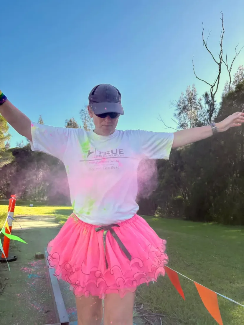 Club members covered in colour at the club colour run