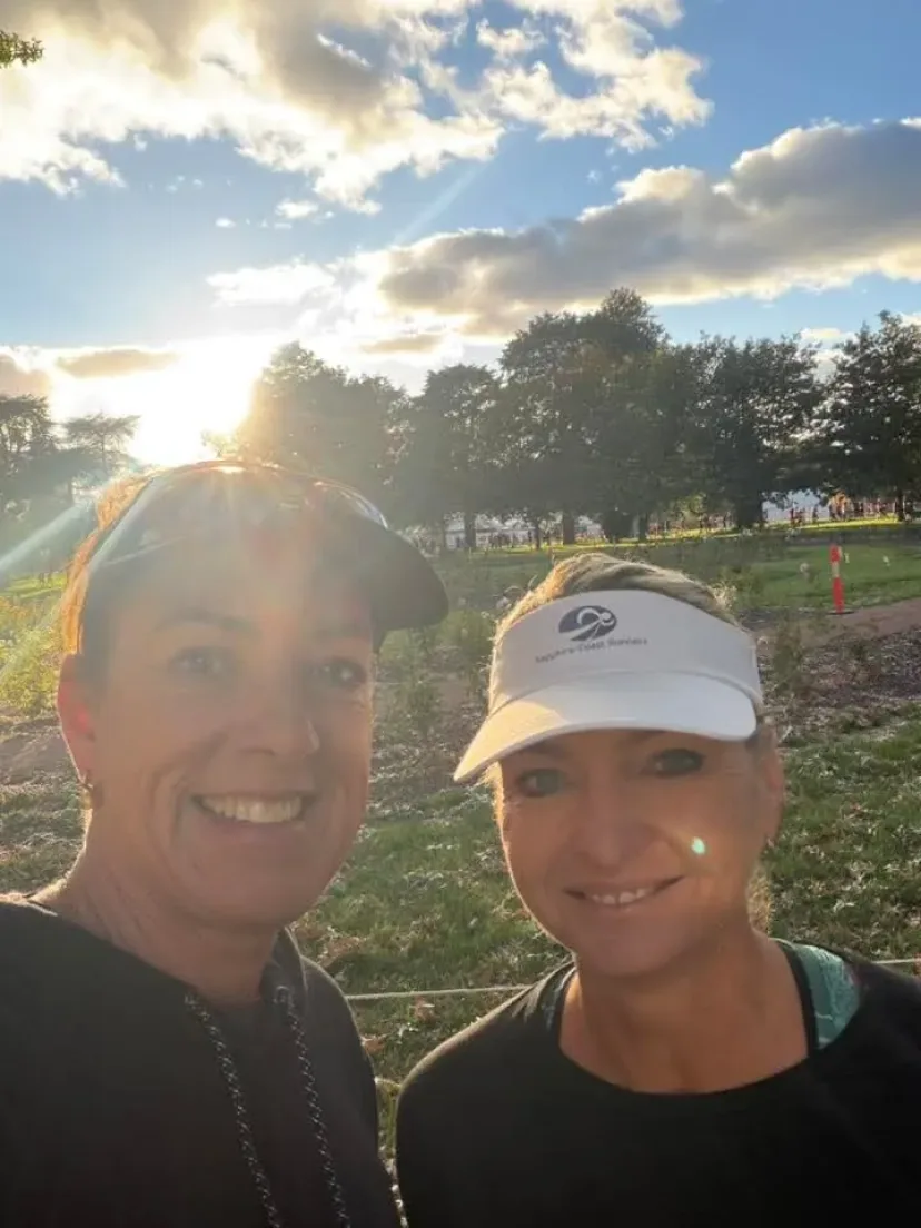 Selfie with Sapphire Coast Runners members running behind