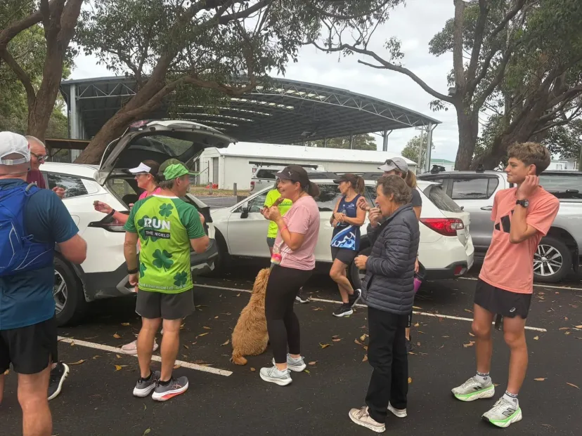 Club members and their dogs before a run