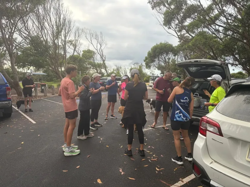 Club members and their dogs before a run