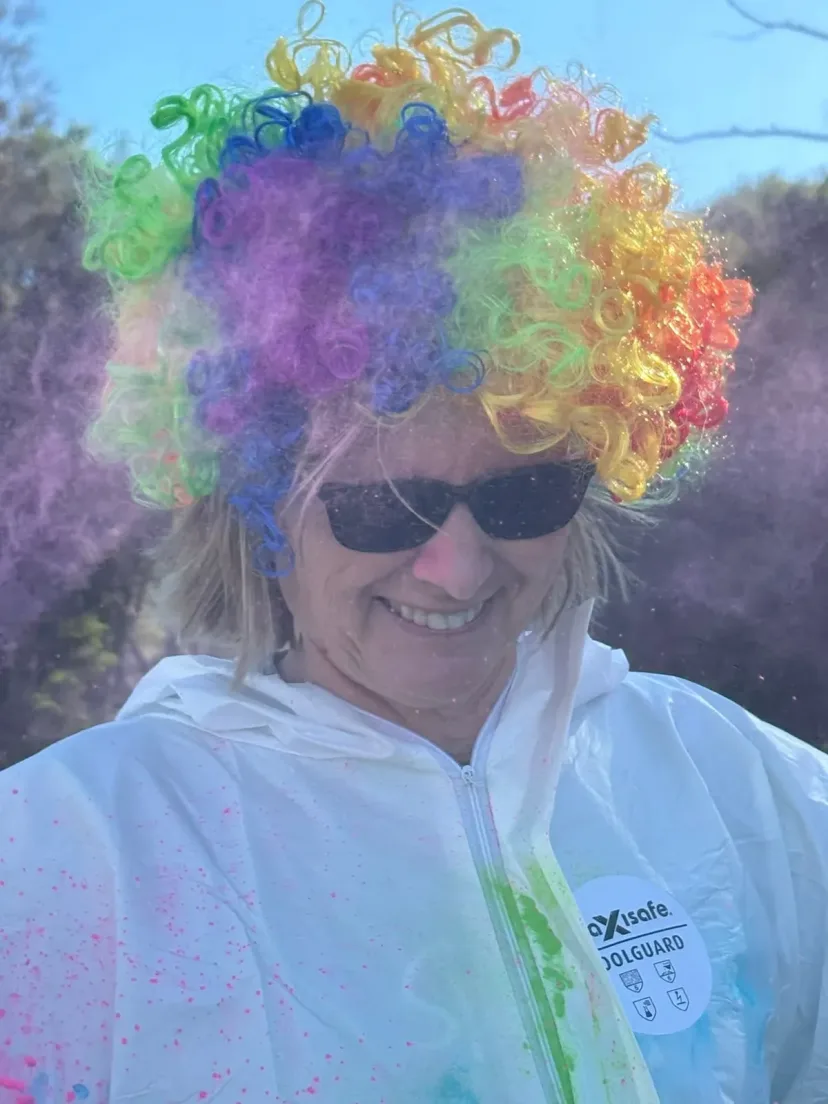 Club members covered in colour at the club colour run