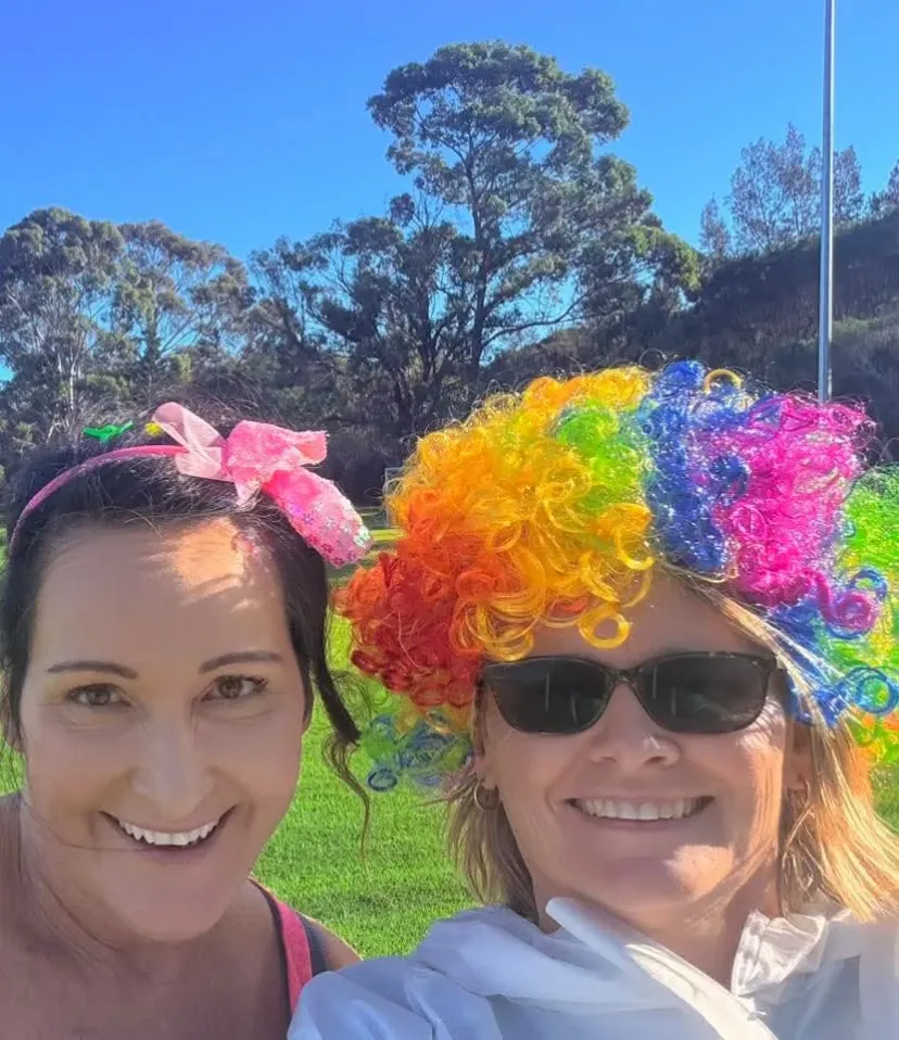 Club members covered in colour at the club colour run