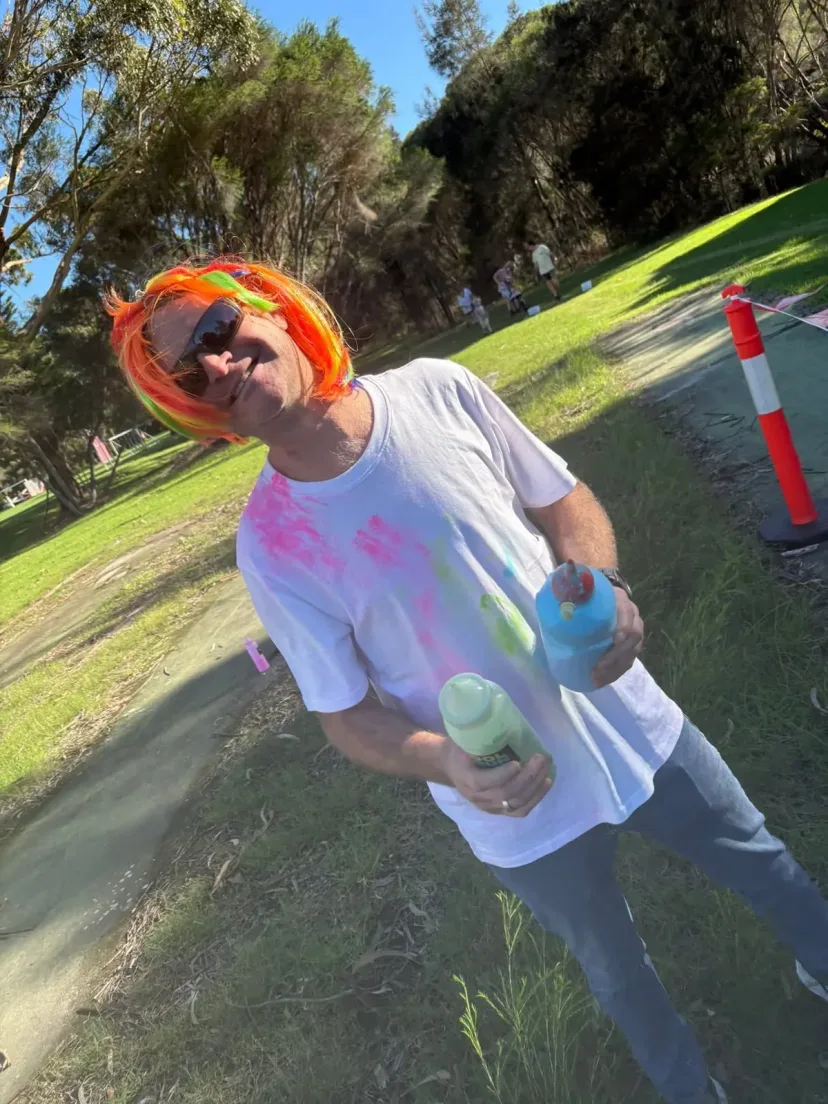 Club members covered in colour at the club colour run