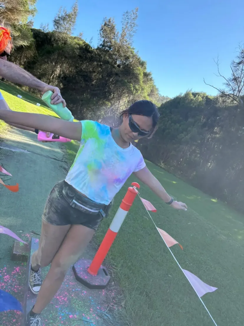 Club members covered in colour at the club colour run
