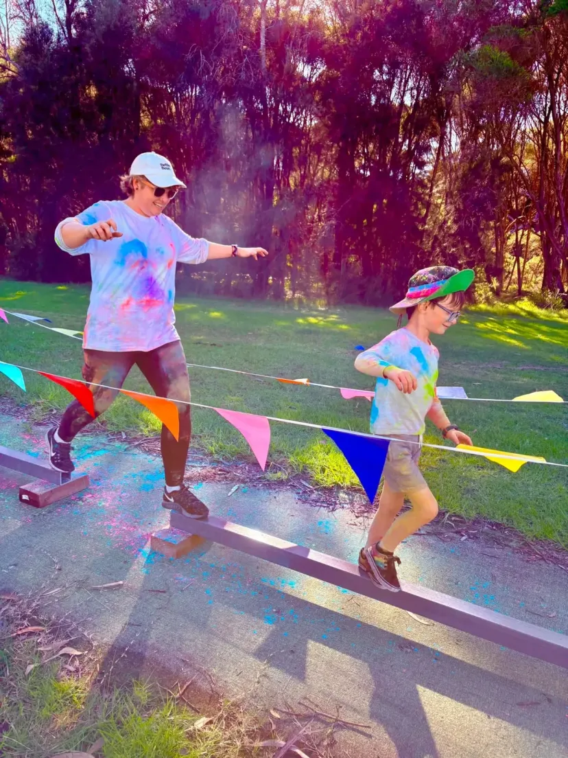 Club members covered in colour at the club colour run