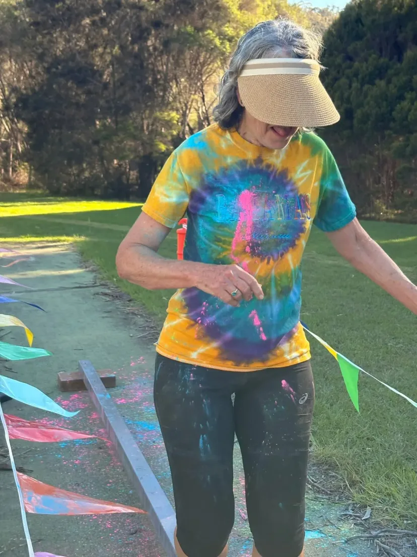 Club members covered in colour at the club colour run