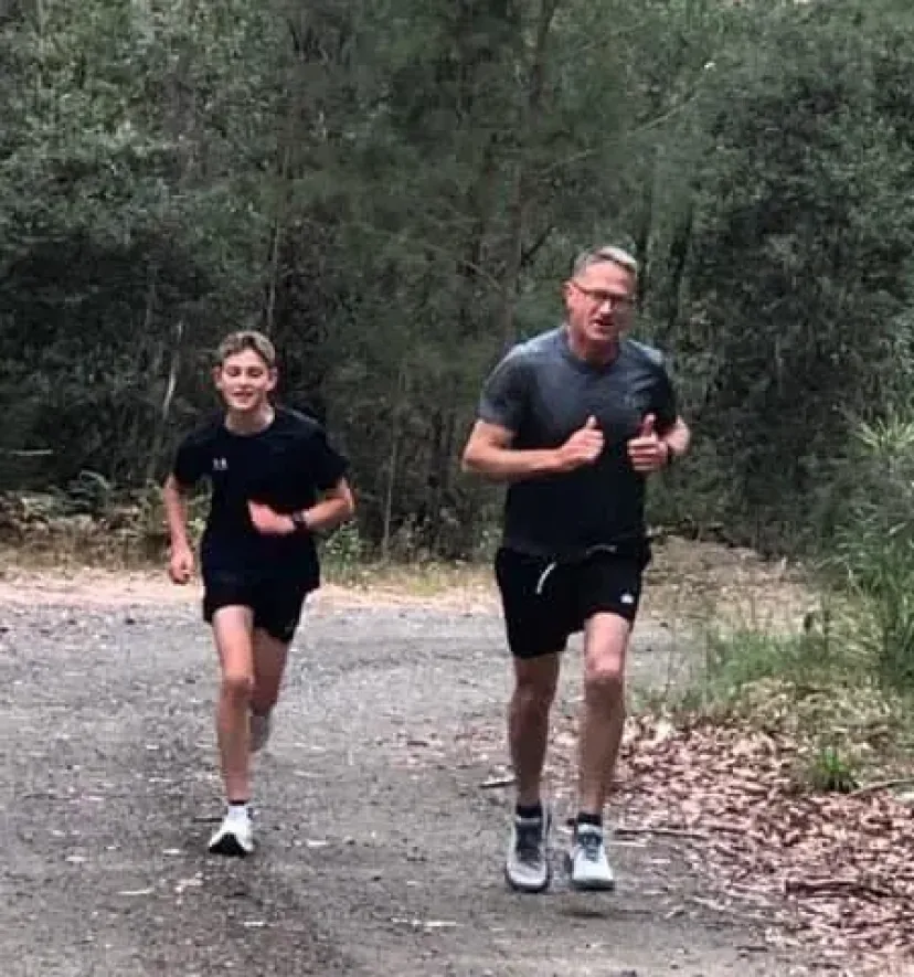 Two Sapphire Coast Runners members running a bush trail together