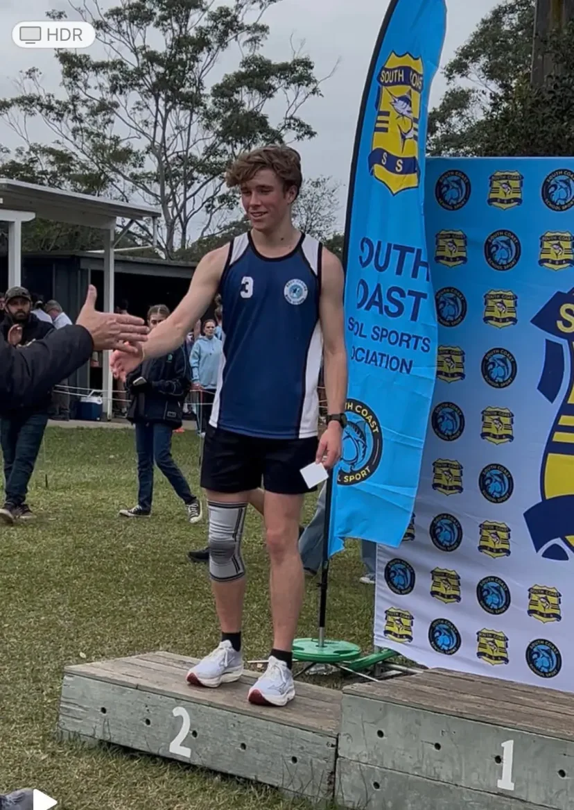 Junior runners on the podium at a carnival
