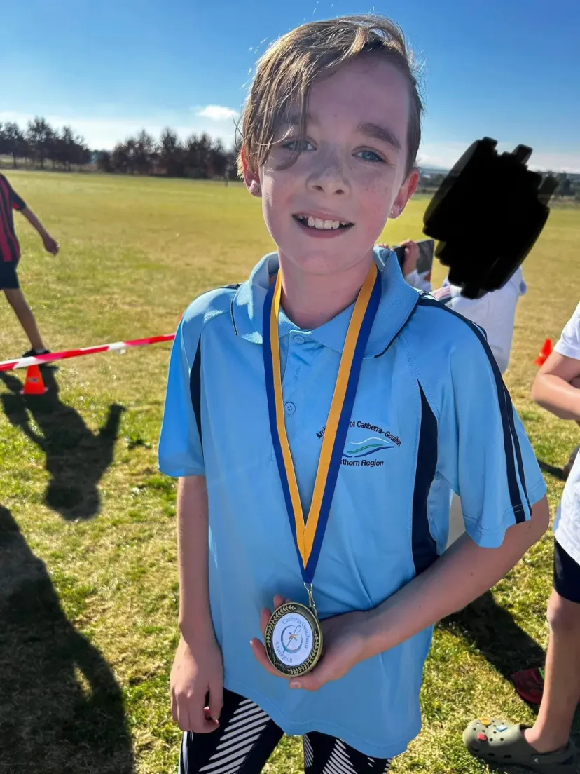 Junior runners on the podium at a carnival